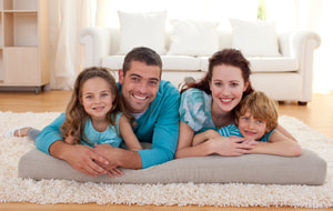 Comfortable family with their new heating and cooling system in Lexington, Kentucky